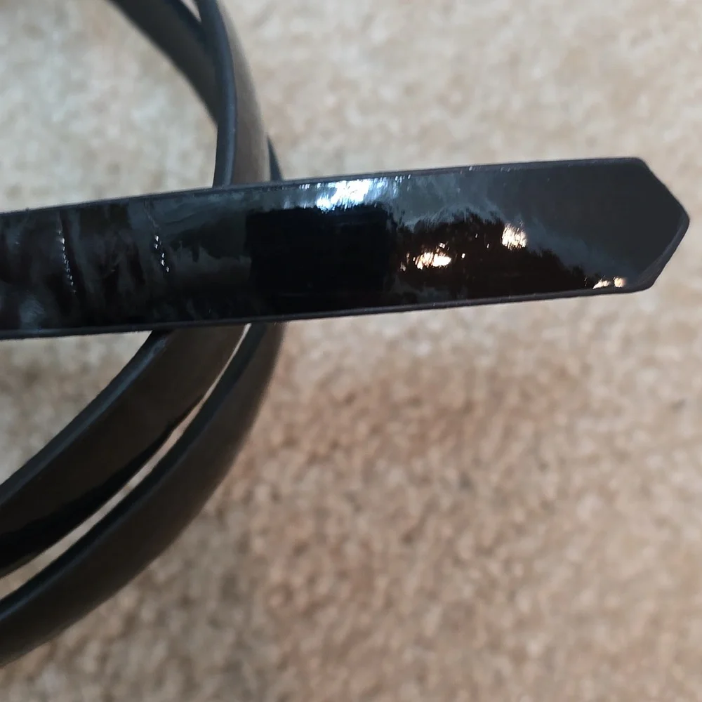 Source Unknown shiny black